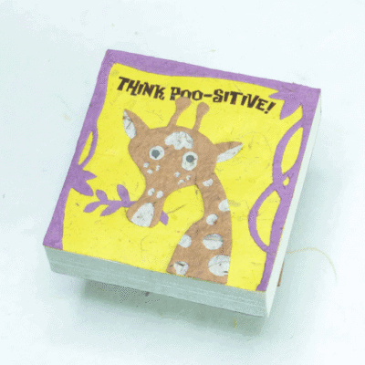 Image of a poo paper scratch pad with a giraffe on it saying think poo-sitive