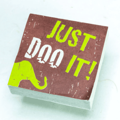 Image of paper scratch pad made out of poo with just doo it written on the front