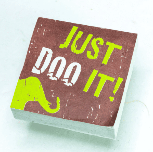 Image of paper scratch pad made out of poo with just doo it written on the front
