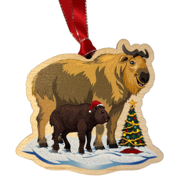 Image of an ornament of a mom and baby Takin in front of a small Christmas tree