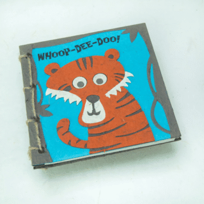 Image of a poo paper journal with a tiger on it saying whoop-dee-doo