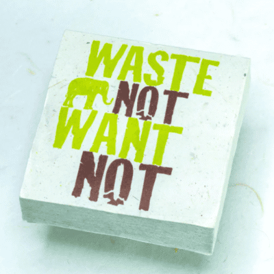 Image of paper scratch pad made out of poo with waste not want not written on the front