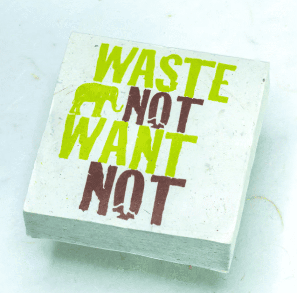 Image of paper scratch pad made out of poo with waste not want not written on the front