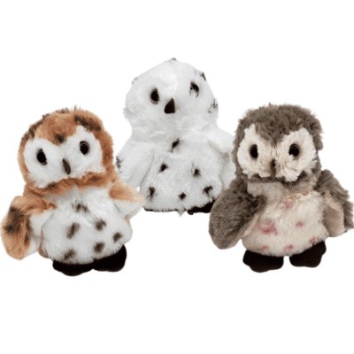 Image of three owl plush toys of different colours.