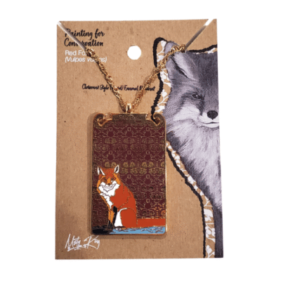 Image of gold, brown and red pendant necklace featuring a fox