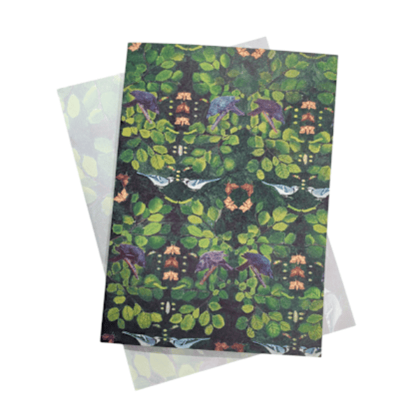 Image of a greeting card with repetitive blue jay and leaf pattern